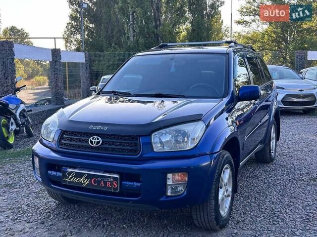 Синий Тойота РАВ 4, объемом двигателя 2 л и пробегом 238 тыс. км за 7000 $, фото 1 на Automoto.ua