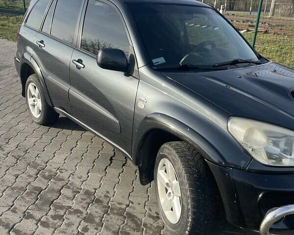 Синий Тойота РАВ 4, объемом двигателя 2 л и пробегом 350 тыс. км за 6500 $, фото 1 на Automoto.ua