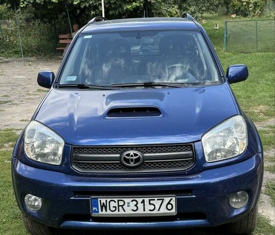 Синий Тойота РАВ 4, объемом двигателя 2 л и пробегом 332 тыс. км за 4000 $, фото 1 на Automoto.ua