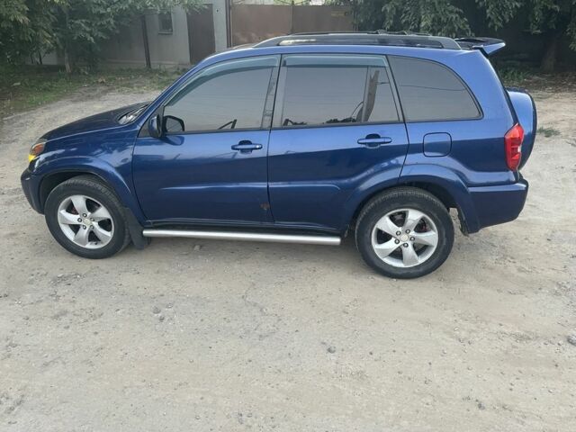 Синий Тойота РАВ 4, объемом двигателя 2 л и пробегом 250 тыс. км за 6133 $, фото 1 на Automoto.ua