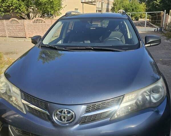 Синий Тойота РАВ 4, объемом двигателя 2.49 л и пробегом 180 тыс. км за 16000 $, фото 1 на Automoto.ua