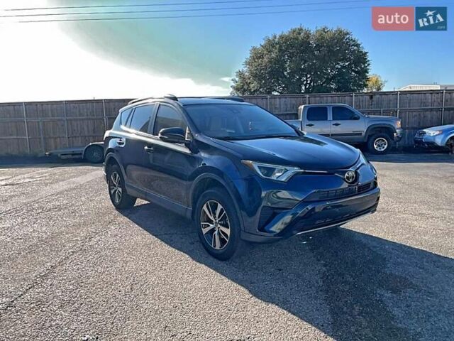Синий Тойота РАВ 4, объемом двигателя 2.49 л и пробегом 138 тыс. км за 5000 $, фото 1 на Automoto.ua