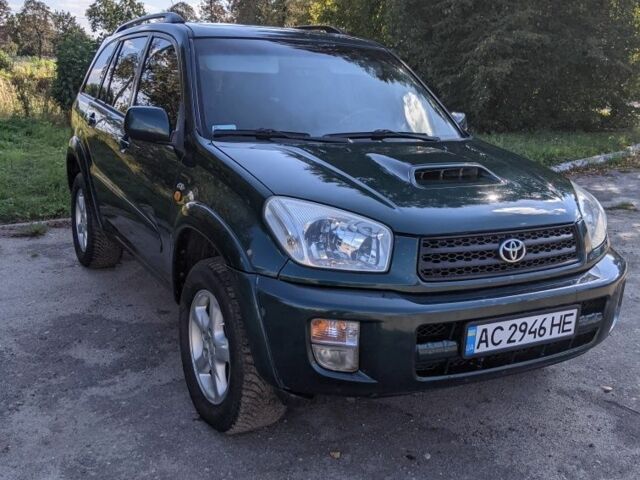 Зелений Тойота РАВ 4, об'ємом двигуна 2 л та пробігом 455 тис. км за 5798 $, фото 1 на Automoto.ua