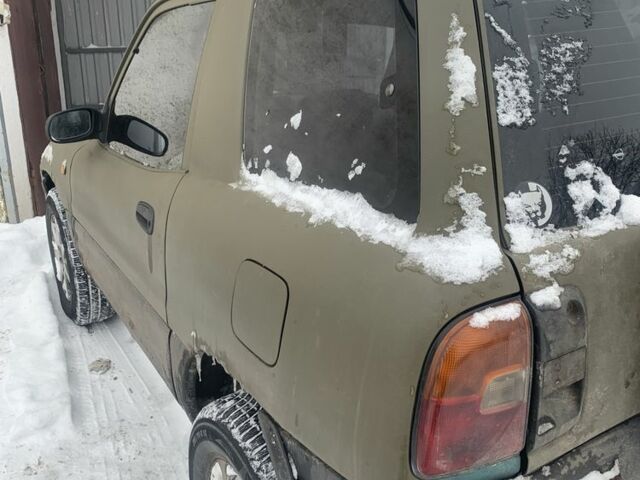 Зеленый Тойота РАВ 4, объемом двигателя 2 л и пробегом 350 тыс. км за 3650 $, фото 1 на Automoto.ua