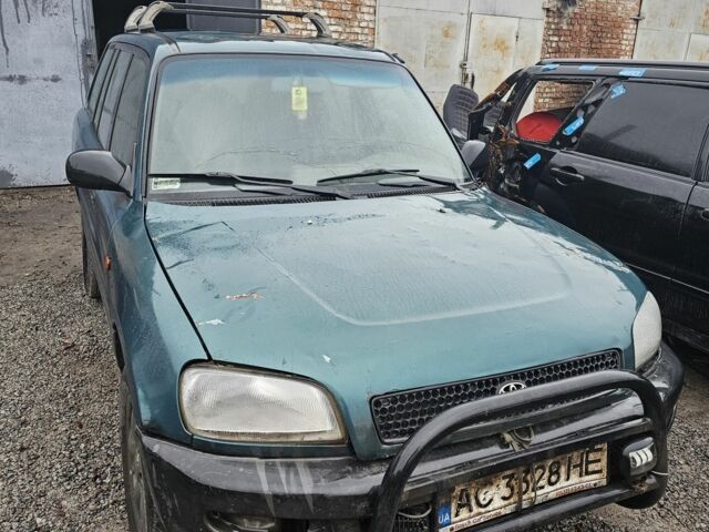 Зеленый Тойота РАВ 4, объемом двигателя 2 л и пробегом 450 тыс. км за 2300 $, фото 1 на Automoto.ua