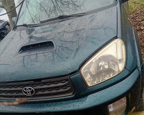 Зеленый Тойота РАВ 4, объемом двигателя 2.2 л и пробегом 550 тыс. км за 2000 $, фото 1 на Automoto.ua