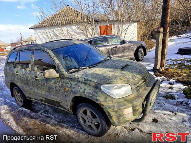 Зеленый Тойота РАВ 4, объемом двигателя 2 л и пробегом 230 тыс. км за 3640 $, фото 1 на Automoto.ua