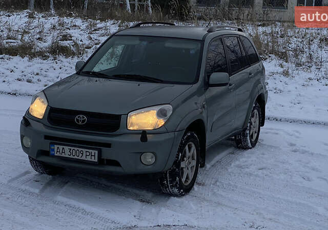 Зеленый Тойота РАВ 4, объемом двигателя 2 л и пробегом 240 тыс. км за 7500 $, фото 1 на Automoto.ua