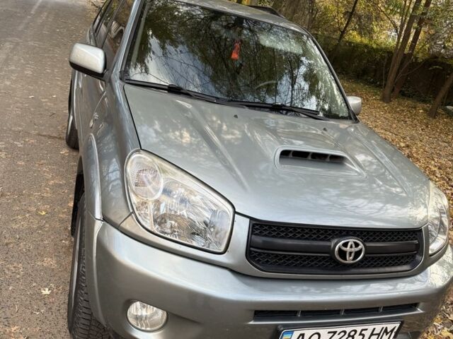 Зеленый Тойота РАВ 4, объемом двигателя 2 л и пробегом 390 тыс. км за 5800 $, фото 1 на Automoto.ua