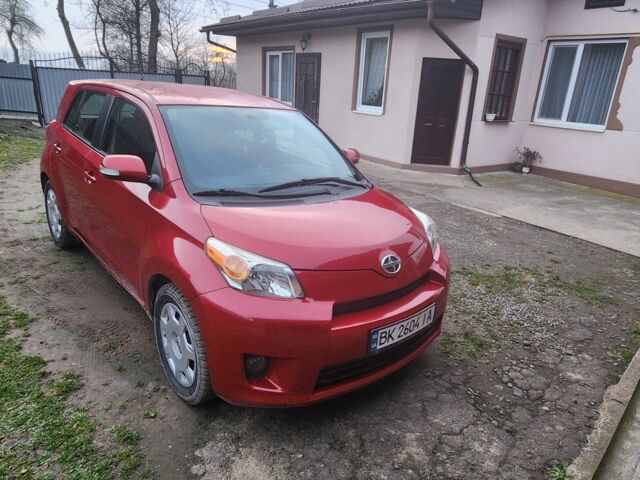 Красный Тойота Сцион, объемом двигателя 1.8 л и пробегом 162 тыс. км за 7200 $, фото 1 на Automoto.ua