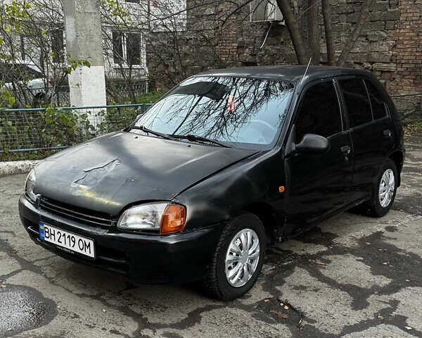 Черный Тойота Старлет, объемом двигателя 1.33 л и пробегом 185 тыс. км за 1150 $, фото 1 на Automoto.ua