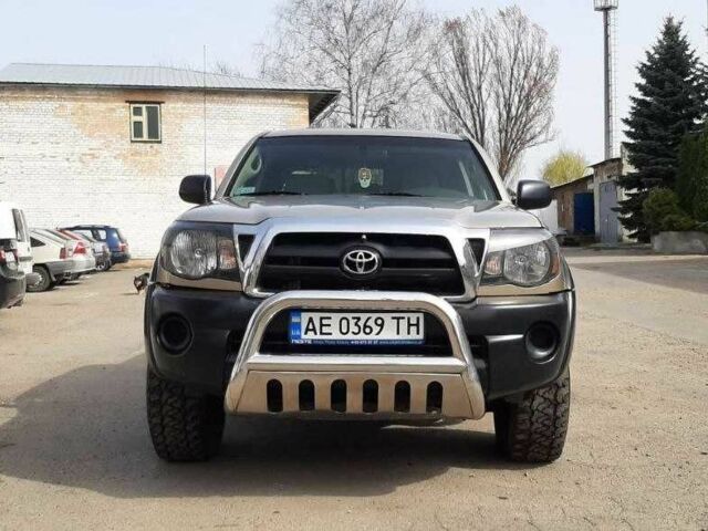 Бежевый Тойота Такома, объемом двигателя 4 л и пробегом 182 тыс. км за 11200 $, фото 1 на Automoto.ua