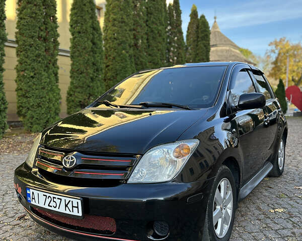 Черный Тойота ХА, объемом двигателя 1.5 л и пробегом 199 тыс. км за 5500 $, фото 1 на Automoto.ua