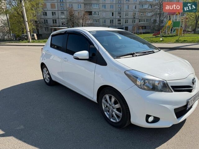 Білий Тойота Яріс, об'ємом двигуна 1.33 л та пробігом 103 тис. км за 11200 $, фото 1 на Automoto.ua