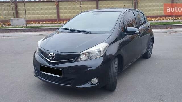Черный Тойота Ярис, объемом двигателя 1.33 л и пробегом 158 тыс. км за 9500 $, фото 1 на Automoto.ua