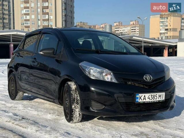 Черный Тойота Ярис, объемом двигателя 1.33 л и пробегом 100 тыс. км за 7000 $, фото 1 на Automoto.ua