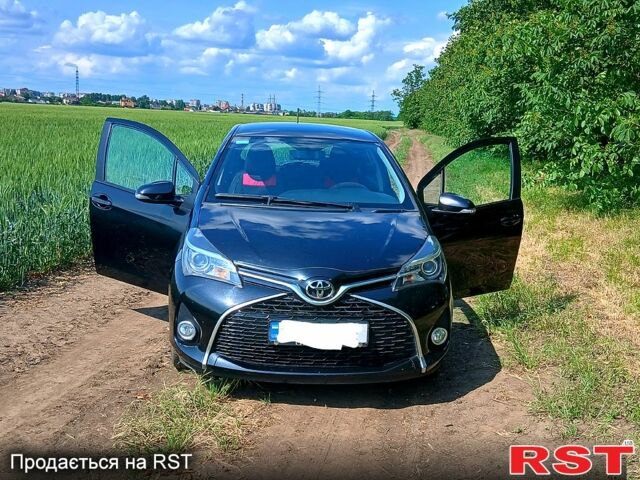 Черный Тойота Ярис, объемом двигателя 1.3 л и пробегом 81 тыс. км за 12800 $, фото 1 на Automoto.ua