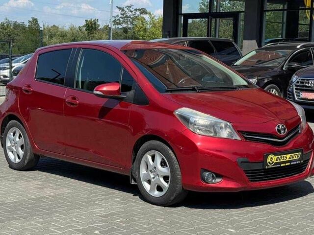 Красный Тойота Ярис, объемом двигателя 1.4 л и пробегом 269 тыс. км за 7600 $, фото 1 на Automoto.ua