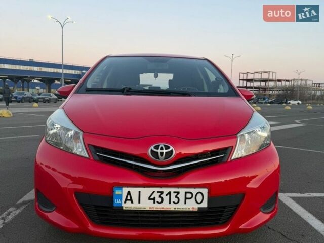 Красный Тойота Ярис, объемом двигателя 1.3 л и пробегом 156 тыс. км за 8500 $, фото 1 на Automoto.ua