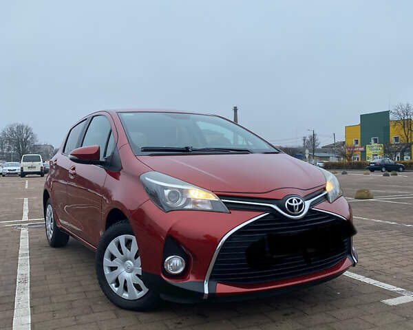 Червоний Тойота Яріс, об'ємом двигуна 1.33 л та пробігом 115 тис. км за 11700 $, фото 1 на Automoto.ua