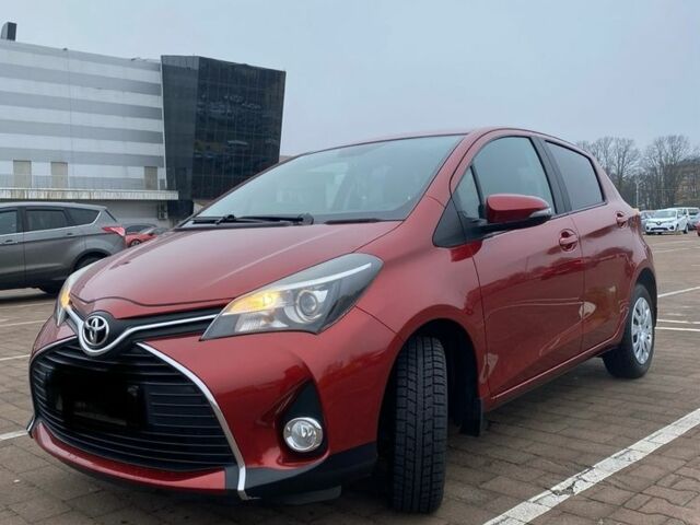 Червоний Тойота Яріс, об'ємом двигуна 1.3 л та пробігом 115 тис. км за 11700 $, фото 1 на Automoto.ua
