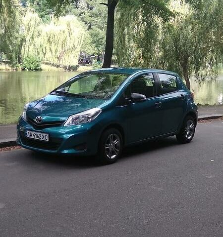 Зелений Тойота Яріс, об'ємом двигуна 1 л та пробігом 120 тис. км за 7000 $, фото 1 на Automoto.ua