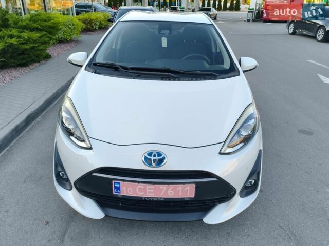 Білий Тойота Aqua, об'ємом двигуна 1.5 л та пробігом 74 тис. км за 12700 $, фото 1 на Automoto.ua