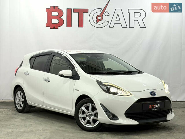 Білий Тойота Aqua, об'ємом двигуна 1.5 л та пробігом 87 тис. км за 13200 $, фото 1 на Automoto.ua