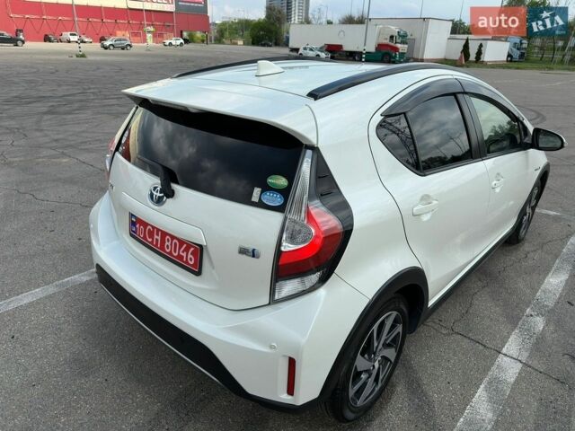 Білий Тойота Aqua, об'ємом двигуна 1.5 л та пробігом 79 тис. км за 14500 $, фото 1 на Automoto.ua