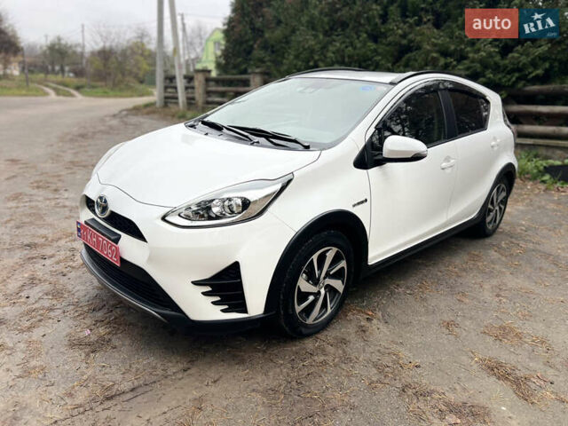 Белый Тойота Aqua, объемом двигателя 1.5 л и пробегом 61 тыс. км за 13200 $, фото 1 на Automoto.ua