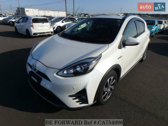 Белый Тойота Aqua, объемом двигателя 1.5 л и пробегом 79 тыс. км за 12700 $, фото 1 на Automoto.ua