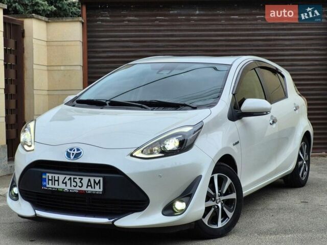 Білий Тойота Aqua, об'ємом двигуна 1.5 л та пробігом 94 тис. км за 12900 $, фото 1 на Automoto.ua