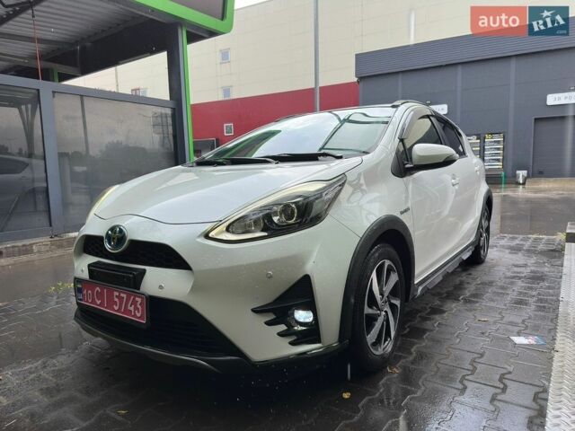 Білий Тойота Aqua, об'ємом двигуна 1.5 л та пробігом 116 тис. км за 14400 $, фото 1 на Automoto.ua