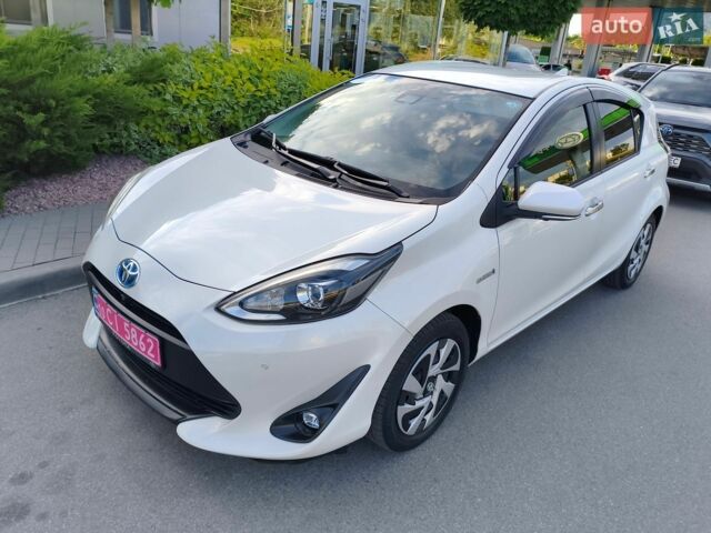 Білий Тойота Aqua, об'ємом двигуна 1.5 л та пробігом 57 тис. км за 12900 $, фото 1 на Automoto.ua
