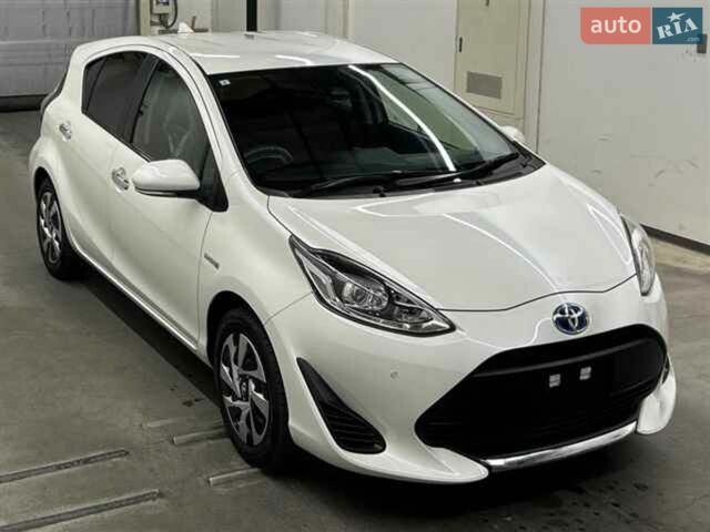 Білий Тойота Aqua, об'ємом двигуна 1.5 л та пробігом 119 тис. км за 11600 $, фото 1 на Automoto.ua