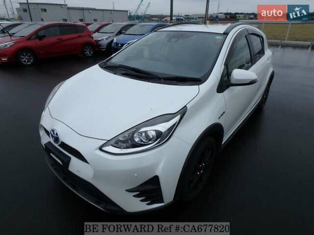 Белый Тойота Aqua, объемом двигателя 1.5 л и пробегом 27 тыс. км за 13500 $, фото 1 на Automoto.ua