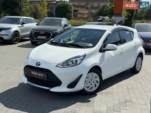 Білий Тойота Aqua, об'ємом двигуна 1.5 л та пробігом 58 тис. км за 13900 $, фото 1 на Automoto.ua