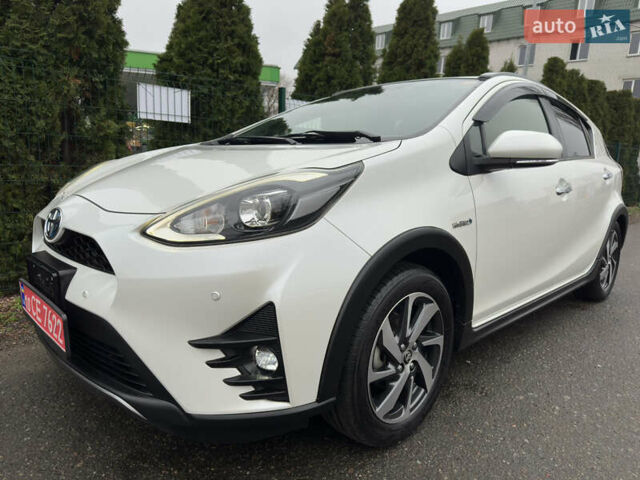 Белый Тойота Aqua, объемом двигателя 1.5 л и пробегом 79 тыс. км за 15950 $, фото 1 на Automoto.ua