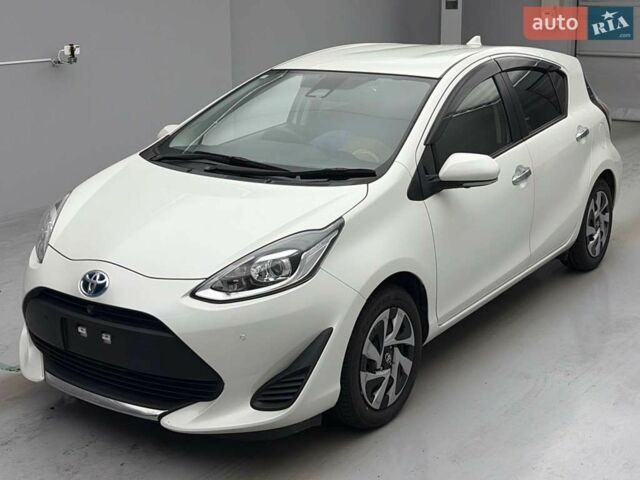 Білий Тойота Aqua, об'ємом двигуна 1.5 л та пробігом 133 тис. км за 12700 $, фото 1 на Automoto.ua