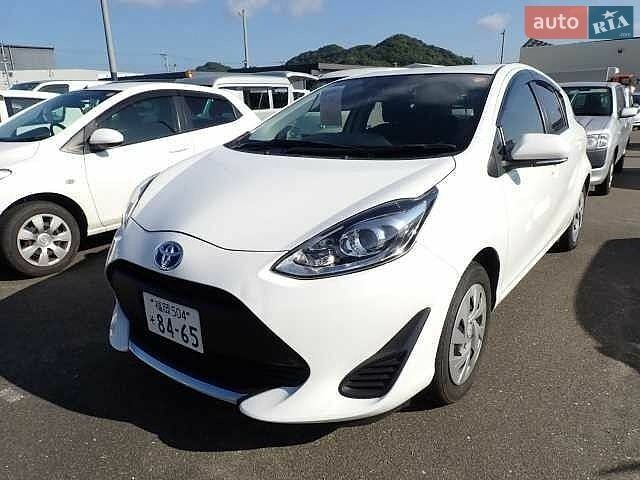 Білий Тойота Aqua, об'ємом двигуна 1.5 л та пробігом 137 тис. км за 11950 $, фото 1 на Automoto.ua