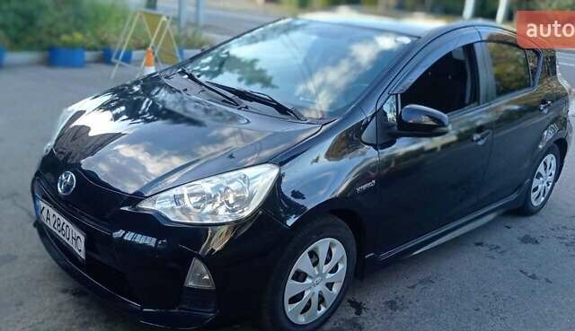 Черный Тойота Aqua, объемом двигателя 1.5 л и пробегом 181 тыс. км за 9400 $, фото 1 на Automoto.ua