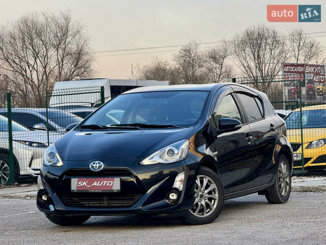 Черный Тойота Aqua, объемом двигателя 1.5 л и пробегом 138 тыс. км за 10900 $, фото 1 на Automoto.ua