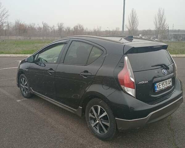 Черный Тойота Aqua, объемом двигателя 1.5 л и пробегом 75 тыс. км за 12500 $, фото 1 на Automoto.ua