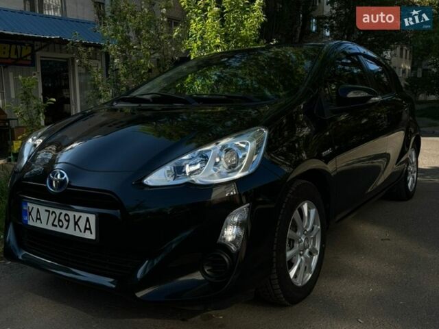 Чорний Тойота Aqua, об'ємом двигуна 1.5 л та пробігом 118 тис. км за 12500 $, фото 1 на Automoto.ua