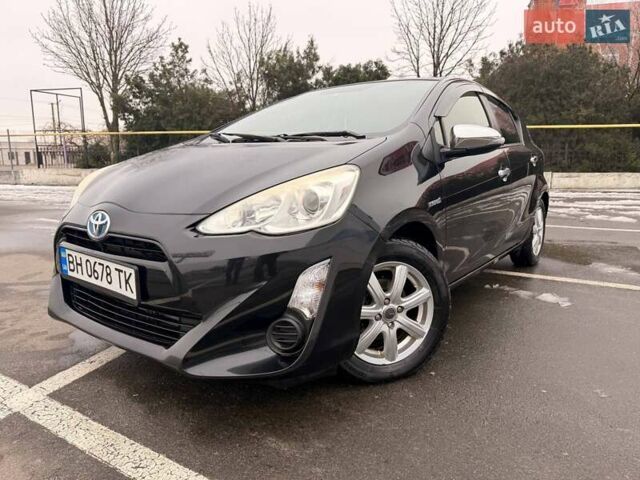 Черный Тойота Aqua, объемом двигателя 1.5 л и пробегом 160 тыс. км за 11200 $, фото 1 на Automoto.ua