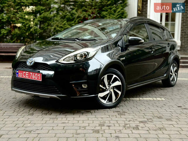 Чорний Тойота Aqua, об'ємом двигуна 1.5 л та пробігом 55 тис. км за 13500 $, фото 1 на Automoto.ua