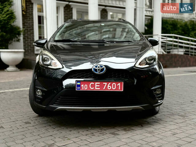 Черный Тойота Aqua, объемом двигателя 1.5 л и пробегом 52 тыс. км за 13500 $, фото 1 на Automoto.ua