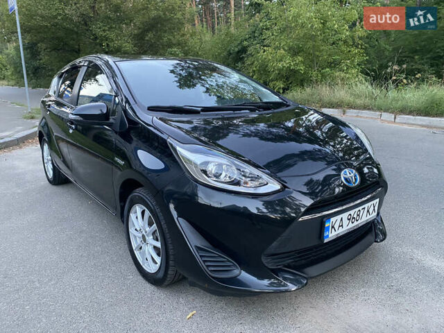 Чорний Тойота Aqua, об'ємом двигуна 1.5 л та пробігом 82 тис. км за 11500 $, фото 1 на Automoto.ua