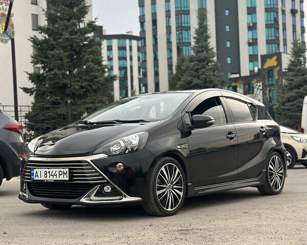 Черный Тойота Aqua, объемом двигателя 1.5 л и пробегом 55 тыс. км за 13200 $, фото 1 на Automoto.ua