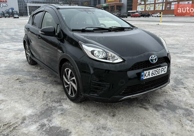 Чорний Тойота Aqua, об'ємом двигуна 1.5 л та пробігом 64 тис. км за 13500 $, фото 1 на Automoto.ua